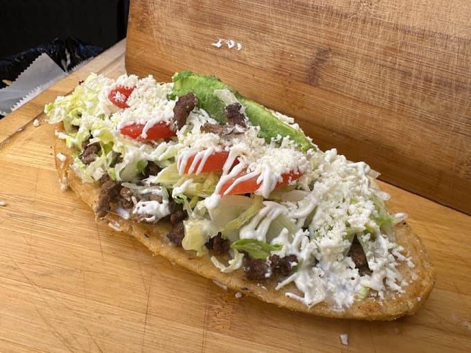 Torta bistek Mexican sandwich with lettuce tomato and queso fresco — lunch and dinner near Houston TX at Too Good Papi Taqueria Humble TX